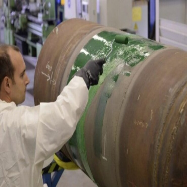 The repair area being primed with Bio-Seal E206