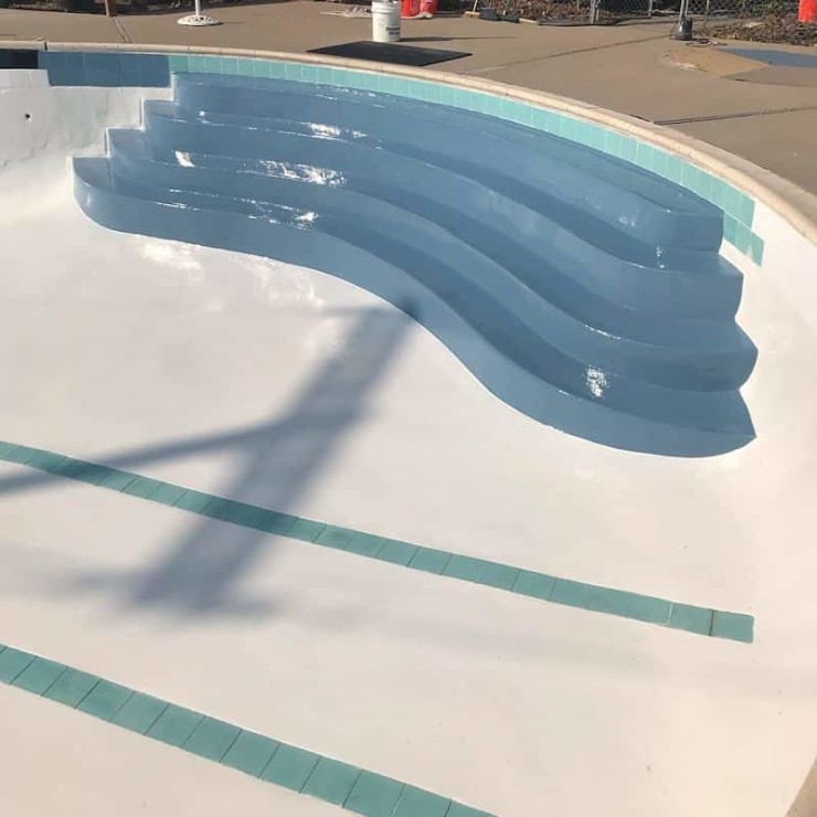 White & Blue E100V Epoxy With Clear 5500 Polyaspartic High Gloss  Topcoat on Blue Area