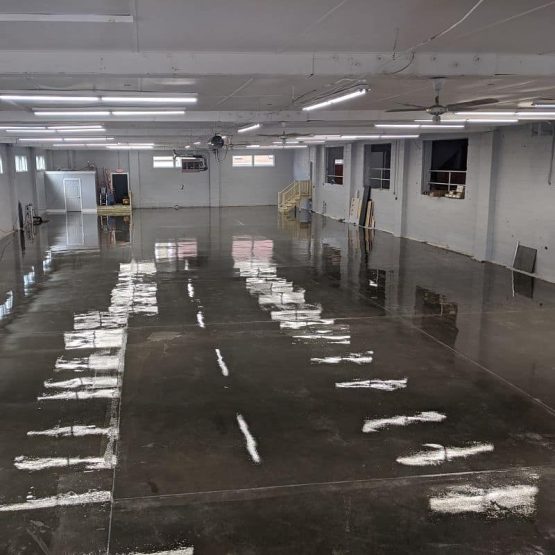 Empty industrial space with polished concrete floor